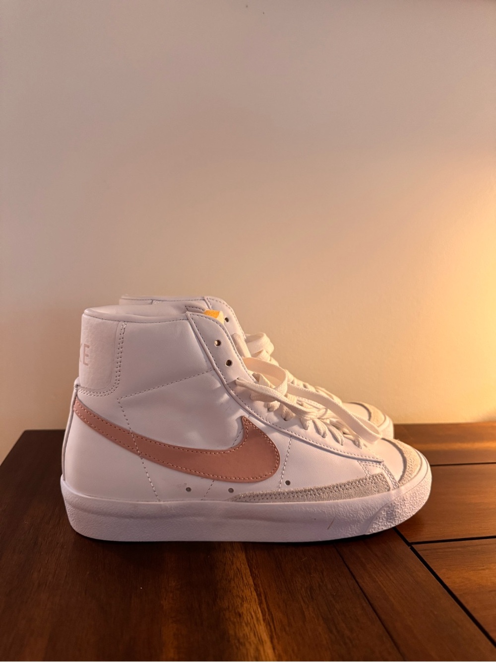 Nike White High-Top Sneakers with Pink Swoosh